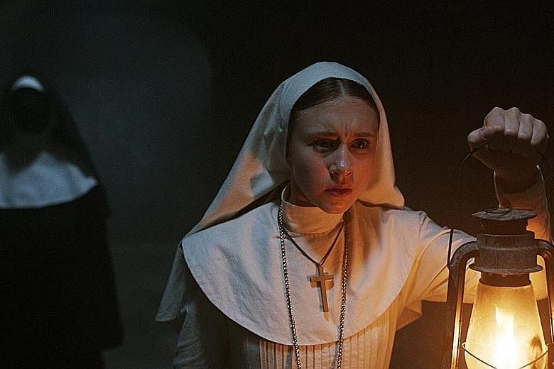 The Nun, starring Taissa Farmiga (above), took in $73.9 million for the three-day weekend at the box office in North America.