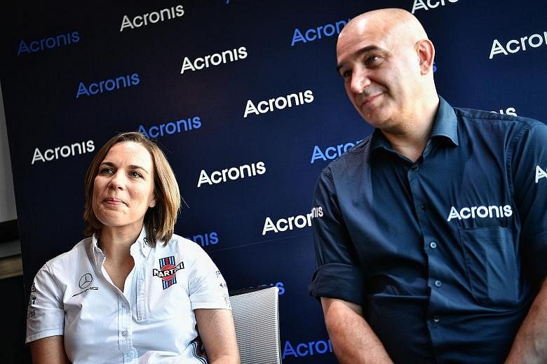 Claire Williams, deputy team principal of Williams, with Serguei Beloussov, CEO of Acronis, the F1 team's strategic technology partner. Williams, who have nine constructors' and seven drivers' titles, are currently last of the 10 teams.