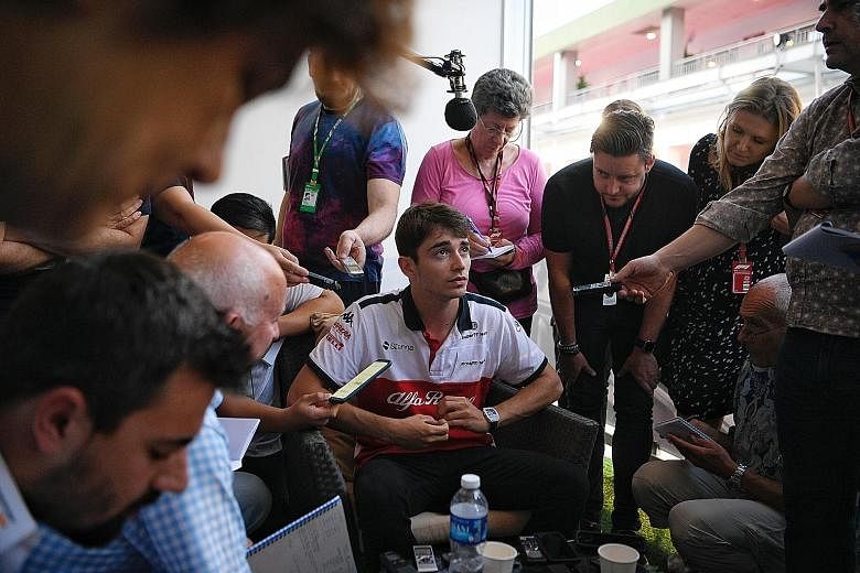 All eyes are on Sauber's Charles Leclerc as he speaks to the media yesterday. He will be replacing Kimi Raikkonen at Ferrari next year.