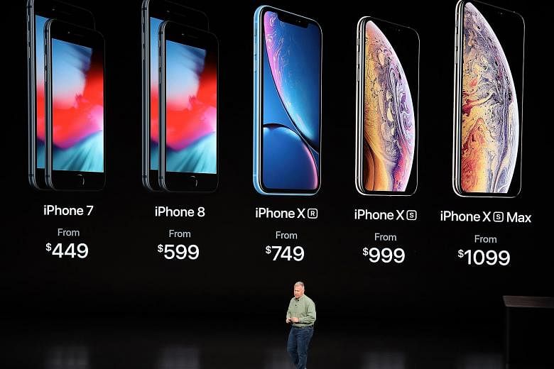 Apple's marketing head Phil Schiller introducing the new iPhone line-up during an event at the Steve Jobs Theatre in Apple Park, California, on Wednesday. All the new iPhones have a front-facing TrueDepth camera system for Face ID, or face recognitio