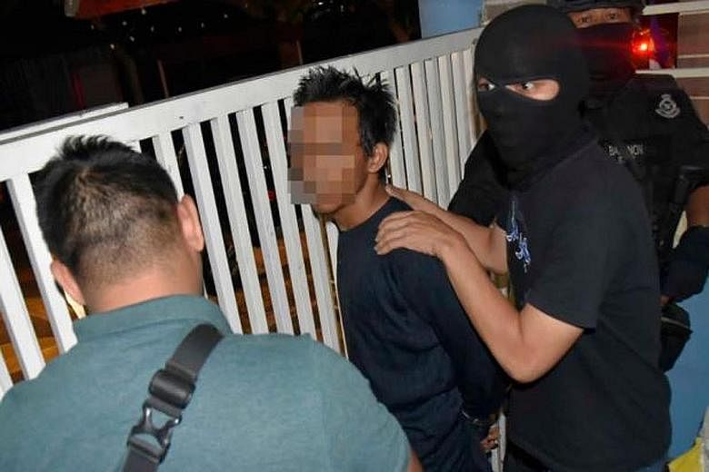 One of the 10 suspected militants nabbed in a series of swoops across seven Malaysian states last month. According to national police chief Mohamad Fuzi Harun, the men were members of two separate terror cells.