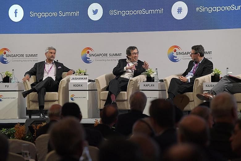 At the Singapore Summit Plenary Session yesterday were (from left) Dr. S Jaishankar, president of global corporate affairs at Tata Sons; Mr Bilahari Kausikan, chairman of the Middle East Institute, National University of Singapore; and Mr Robert D. K