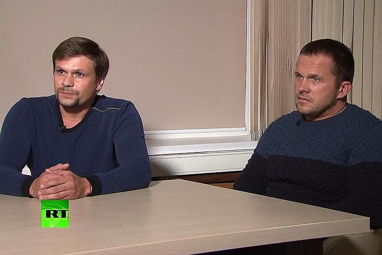 The two men claimed in the Kremlin-backed RT interview last Friday that they were in Salisbury, England, to see the spire atop the cathedral around the time that Mr Sergei Skripal and his daughter were poisoned on March 4. But Russian business paper 