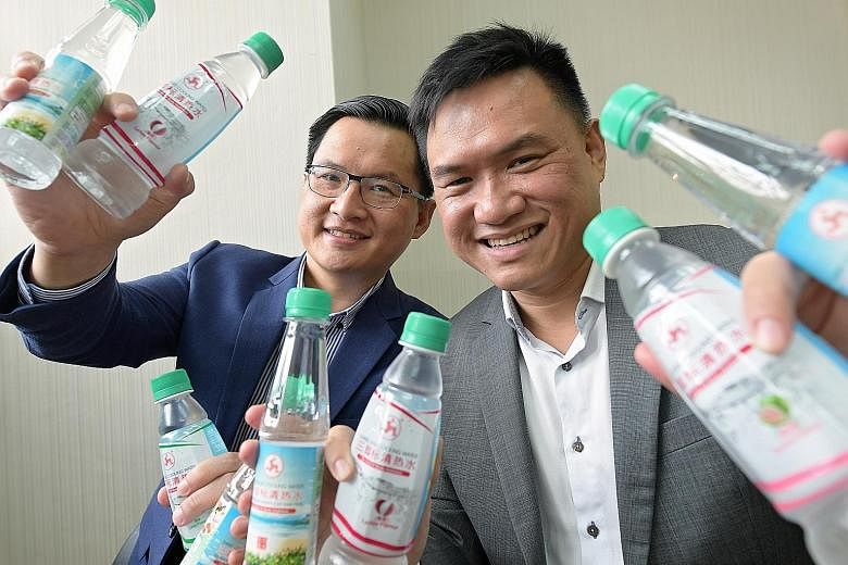 Brothers Fu Shou Jeen (top left) and Fu Siang Jeen are third-generation directors of Wen Ken Group, known for its Three Legs Cooling Water drink (above).