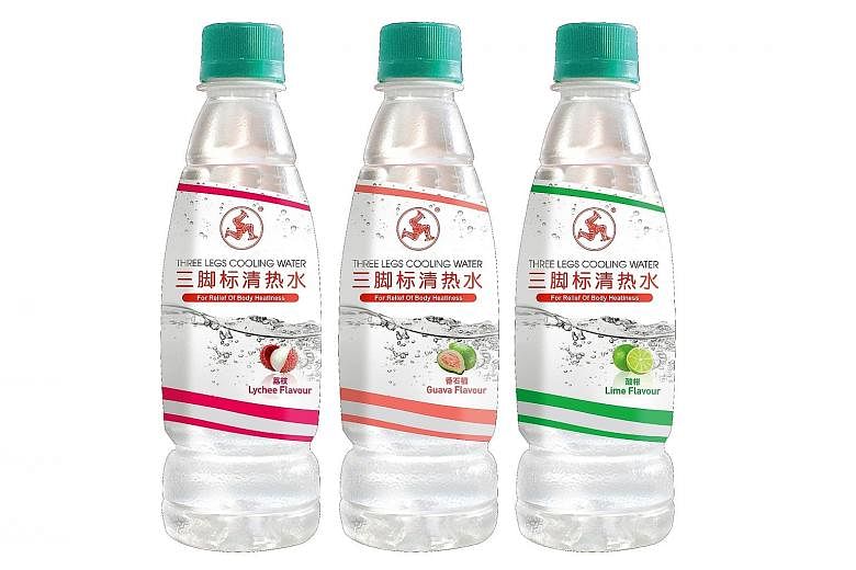 Brothers Fu Shou Jeen (top left) and Fu Siang Jeen are third-generation directors of Wen Ken Group, known for its Three Legs Cooling Water drink (above).