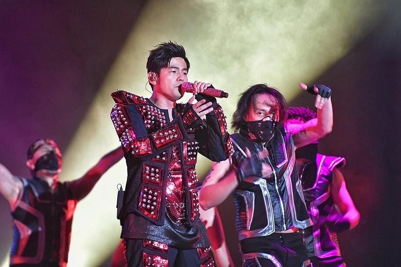 Embracing bright colours and shiny sequins, Taiwanese singer Jay Chou churned out his hits at his Formula One concert.