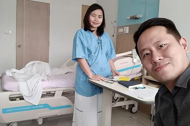 Mr Eugene Wee and his Thai wife Kanokrat Suebsakwong, who endured over 30 hours of labour to deliver their stillborn baby so that the foetus can be donated to research on a genetic disorder.