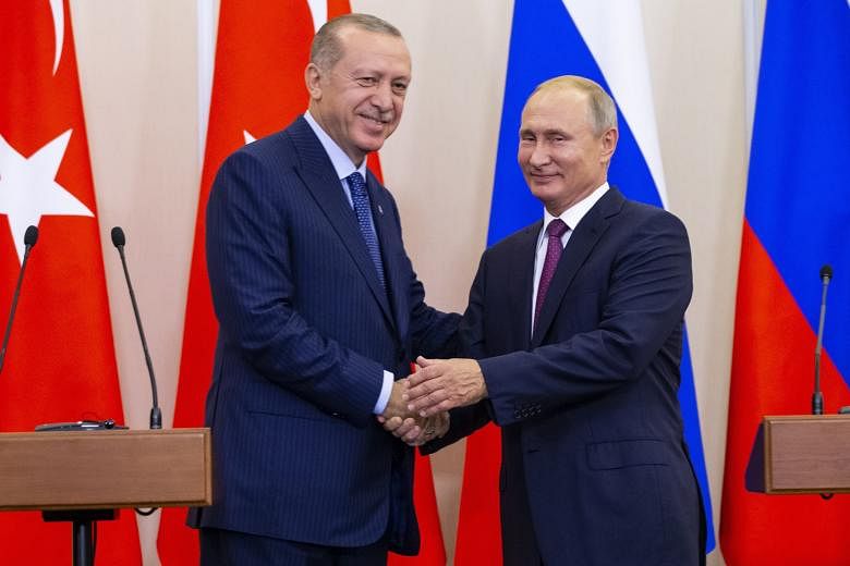 Russian President Vladimir Putin and Turkish leader Recep Tayyip Erdogan have agreed to establish a demilitarised zone in Syria's Idlib province.