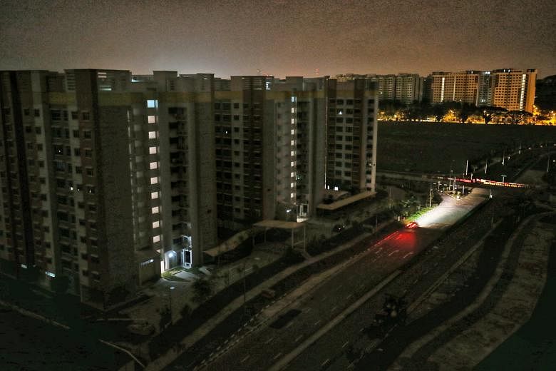 Canberra Crescent in the Sembawang area was plunged into darkness early on Tuesday morning during the blackout that affected 19 areas in Singapore, including Bedok, Thomson, Mandai, Admiralty and Woodlands. Residents gathered at the void decks until 