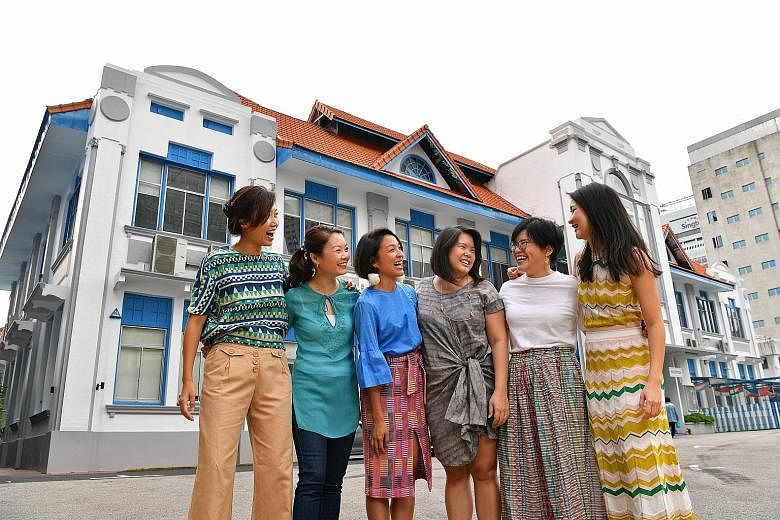 Singapore Chinese Girls' School alumnae (from far left) Daphne Yuan, 34; Lim Swee Keng, 45; Sarah Lin, 35; Melisa Chan, 38; Natalie Kwee, 30; and Jackie Lin, 33, at the site of their old school campus. The team of volunteers launched the campaign to 