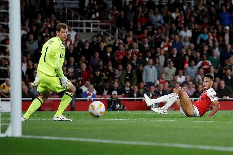 Pierre-Emerick Aubameyang putting Arsenal 1-0 up against unheralded Ukrainians Vorskla in the Europa League. He scored their third goal too but lapses in concentration saw the Gunners concede two late goals to win 4-2.