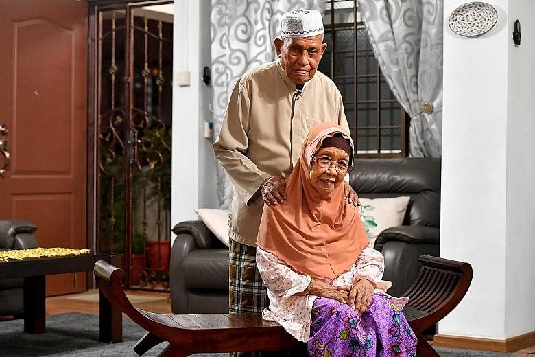 Mr Kassim and Madam Tuminah (seated in the middle of the sofa) with their 12 children. Having many children has helped to bond the family for Haji Kassim Sultan, 98, and Hajah Tuminah Haji Siraj, 88. They have been married for 73 years.