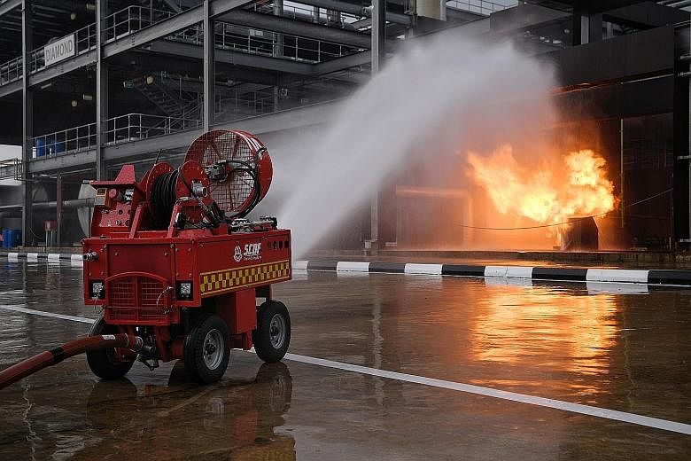 One of the new technologies being explored by the Singapore Civil Defence Force is the Pumper Firefighting Machine, a remotely controlled device that can get close to fires without risking the lives of firefighters.
