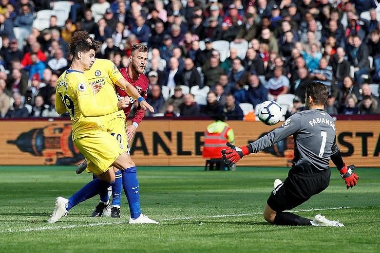 West Ham goalkeeper Lukasz Fabianski saving Chelsea striker Alvaro Morata's effort from close range with his face, summing up the Blues' frustrating outing at the London Stadium yesterday.