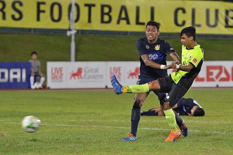 Saifullah Akbar (in yellow) marking his professional debut with a goal for Tampines Rovers in The New Paper League Cup in 2016. He recently turned down an offer to play for Tenerife's reserve side in the Spanish fourth tier.