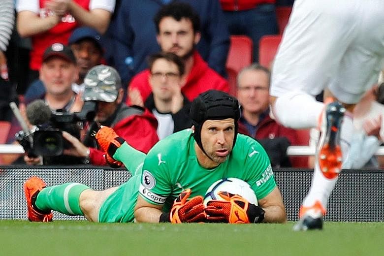 Petr Cech showed a safe pair of hands in Arsenal's 2-0 Premier League home win over Everton on Sunday, as manager Unai Emery celebrated his team's first clean sheet of the season.
