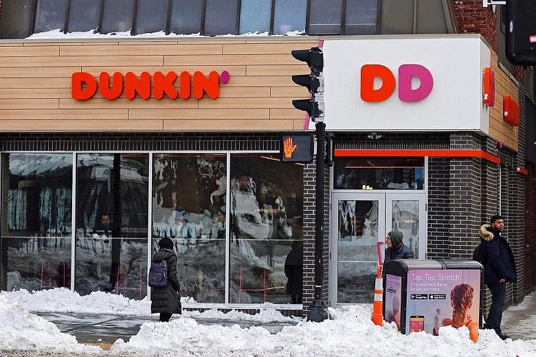 A renamed Dunkin' in Boston, Massachusetts. Despite dropping "Donuts" from its name, the American chain will still sell doughnuts.