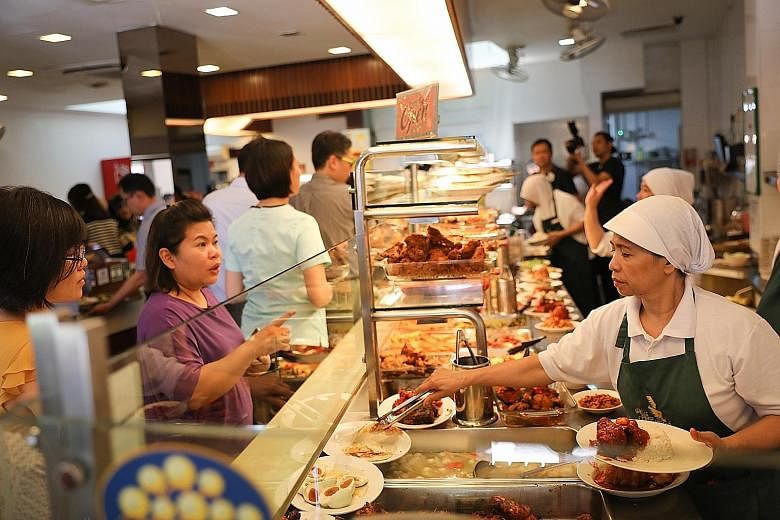 Restaurants Hjh Maimunah (above), Mamanda and Pu3, along with hawker stall Dapur Bonda Khadijah at Berseh Food Centre, have joined the programme in which HPB works with the food and beverage industry to offer more healthy lower-calorie meals and redu