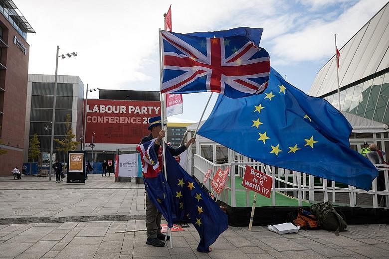 An anti-Brexit campaigner in Liverpool on the closing day of the annual Labour Party conference in the British city yesterday.