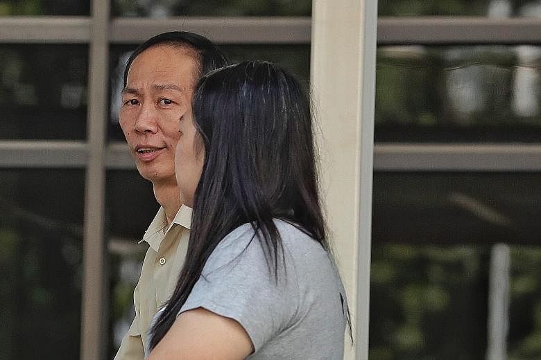 Immigration and Checkpoints Authority officer Chin Peng Sum with his wife Lee Lay Chin. Aside from allegedly receiving sexual gratification from two Chinese women, he is also accused of sharing information with them and two others about impending rai