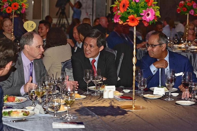 (From left) British High Commissioner Scott Wightman, Trade and Industry Minister Chan Chun Sing and British Chamber of Commerce president Bicky Bhangu at the business awards event yesterday.