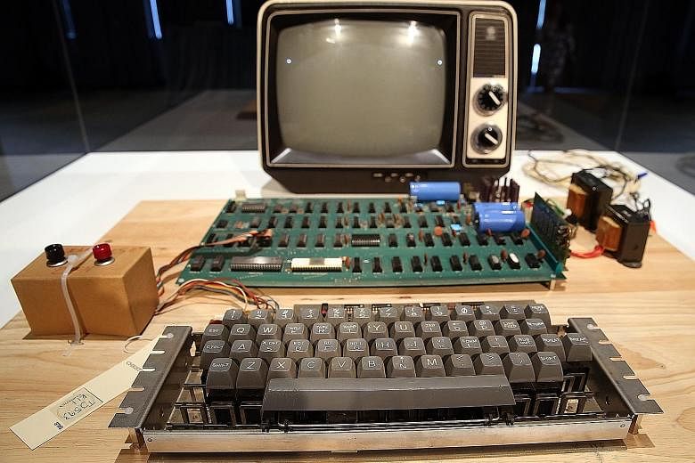An Apple-1 on display at an online auction. The Apple-1 originally went for US$666.66, when it was sold by the Byte Shop computer store in Mountain View, California.