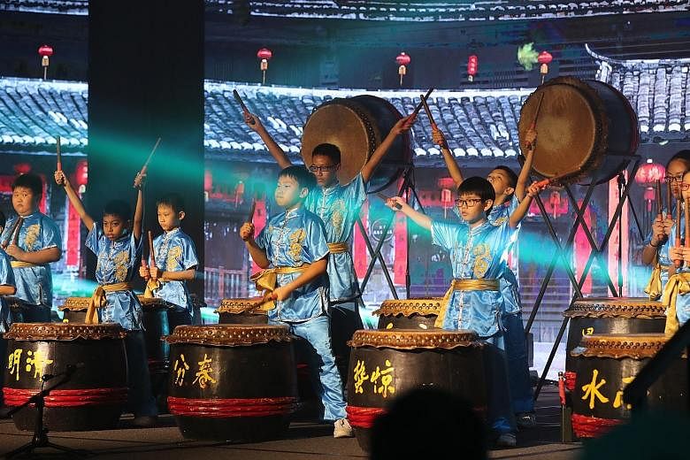 The Qifa Chinese Drum Troupe performing at the Char Yong (Dabu) Association's 160th anniversary gala dinner at Marina Bay Sands yesterday. Prime Minister Lee Hsien Loong cited the association as one that has worked hard to attract and groom its young