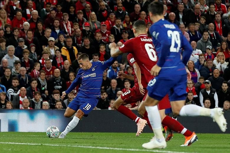 Eden Hazard putting his angled shot into the far corner, having taken possession in central midfield and managing to overcome several challenges. The goal gave Chelsea a 2-1 League Cup win at Liverpool on Wednesday.