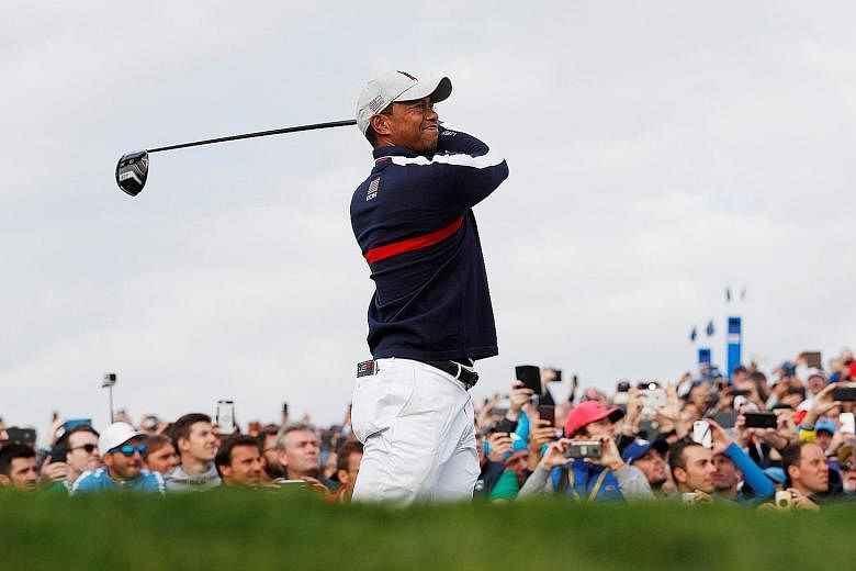 Tiger Woods was paired with Patrick Reed during the opening Ryder Cup four-ball matches at Le Golf National in Paris yesterday. Their loss was the only blot on a fine morning for the Americans, who are defending their title but have not won in Europe