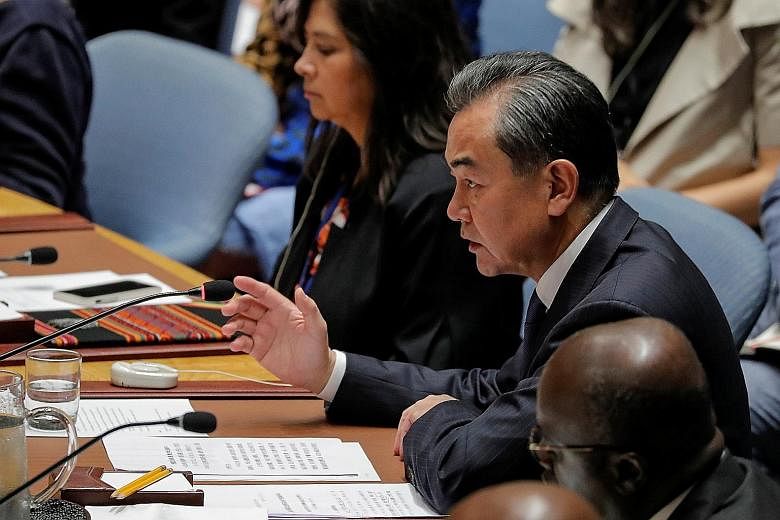 Chinese Foreign Minister Wang Yi speaking during a meeting of the United Nations Security Council in New York on Thursday. US Secretary of State Mike Pompeo told the Security Council that until the denuclearisation of the Korean peninsula is complete