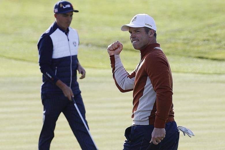 Team Europe's Paul Casey on the way to sealing an impressive 3 and 2 victory over Dustin Johnson and Rickie Fowler alongside fellow Englishman Tyrrell Hatton.