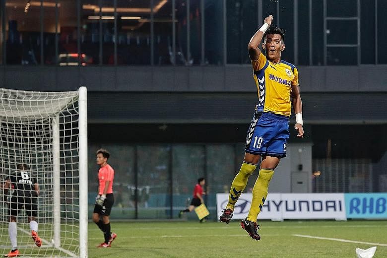 Tampines Rovers' Khairul Amri jumping for joy after scoring his penalty against Home United during the 1-1 Singapore Premier League draw at Our Tampines Hub yesterday.