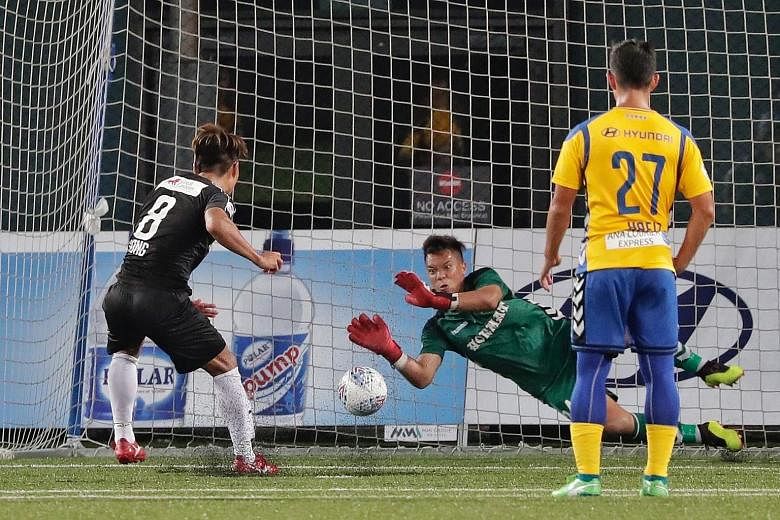 Stags goalkeeper Syazwan Buhari saving a penalty kick from Home United's Song Ui-young in stoppage time.