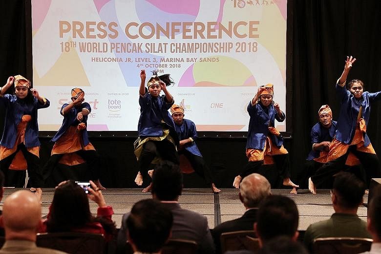 Performers at yesterday's official press conference for the 18th World Pencak Silat Championship in Singapore from Dec 11 to 17. Persisi was given only five months to prepare after Indonesia pulled out as host.