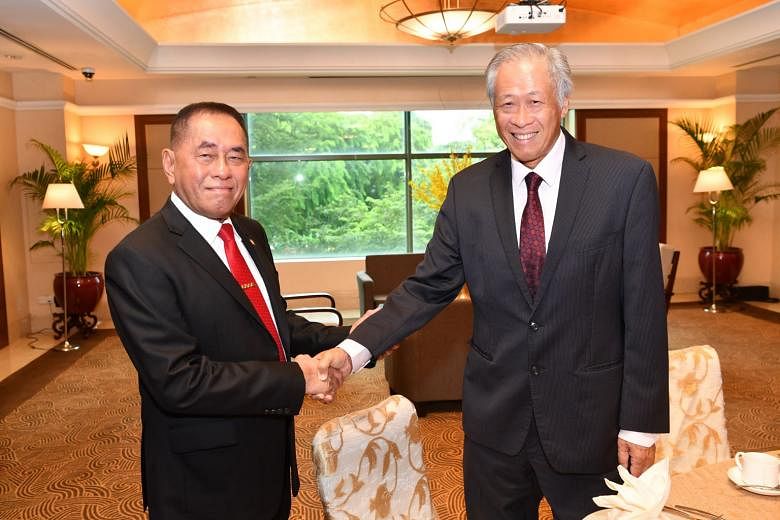 Singapore Defence Minister Ng Eng Hen (right) with Indonesian Defence Minister Ryamizard Ryacudu yesterday. They reaffirmed the close and longstanding bilateral defence ties between the two countries.