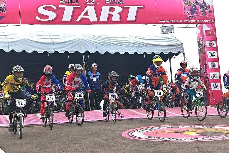 Singapore's BMX cyclists at the start point of the Asian BMX Championships in Thailand earlier this year. The Singapore Cycling Federation Academy, which will open at Turf City Centaurs next month, will introduce new riders to the discipline.