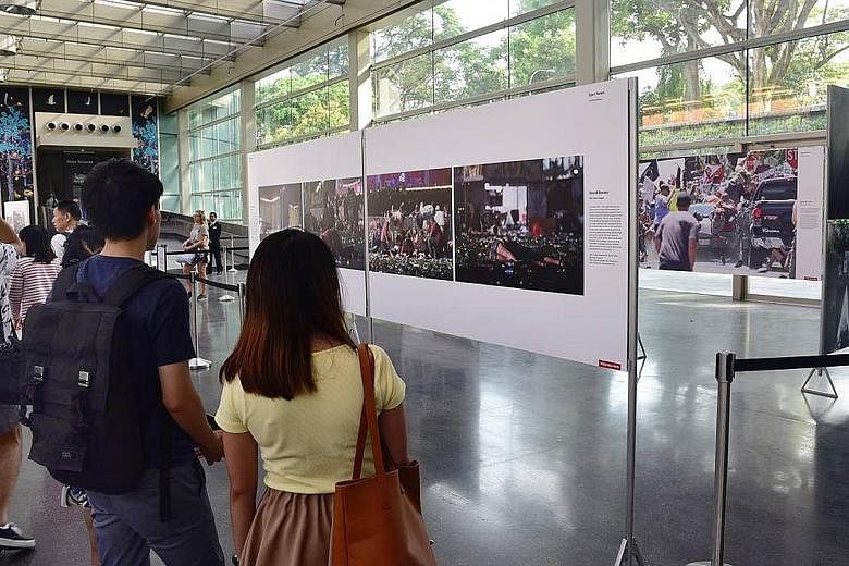 Visitors at the launch of the World Press Photo Exhibition 2018 yesterday. It features 161 photos by 42 photographers lauded for their moving images in the non-profit organisation's annual competition.