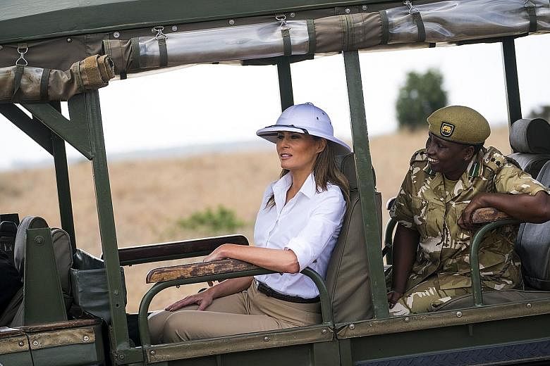 United States First Lady Melania Trump on a safari at Nairobi National Park in Kenya last Friday, wearing a white pith helmet - a common symbol of European colonial rule. Earlier this year, she wore an "I really don't care. Do U?" jacket on the way t