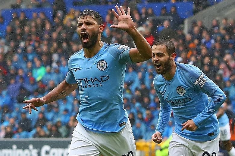 Man City striker Sergio Aguero celebrating with midfielder Bernardo Silva after scoring the opening goal away to Cardiff in the Premier League last month. They won 5-0 - their biggest win this season, alongside the 6-1 home demolition of Huddersfield