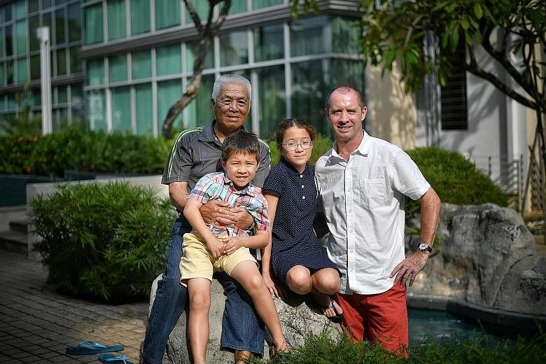 Left: LTC (Ret) Clarence Tan with his son-in-law Thomas Squire and grandchildren Emma and Luke. Above: The book, by Mr Squire, goes on sale next month.