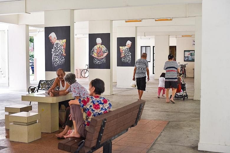 Public art installation, Kindling (above), comprising portraits of senior residents in Chong Pang, is part of a series of workshops under the Both Sides, Now project to engage the community on end-of-life issues.