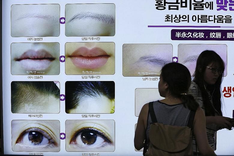 A patient who went to South Korea for a facelift (above) ended up with infection setting in after the procedure, and pus accumulating in both of her cheeks. South Korea is one of the world's hot spots for plastic surgery. In the district of Gangnam, 