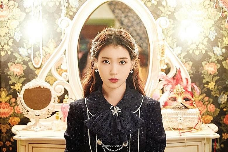 Singer IU (above) and boyband BTS (left, performing at the Citi Field stadium in New York) will hold concerts in Singapore on Dec 15 and Jan 19 respectively.
