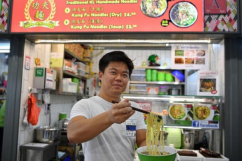 Former part-time bartender Kwan Yee Liang, who sells handmade noodles, runs the other incubation stall at Block 163 Bukit Merah Central Food Centre. He now earns about $3,000 a month.