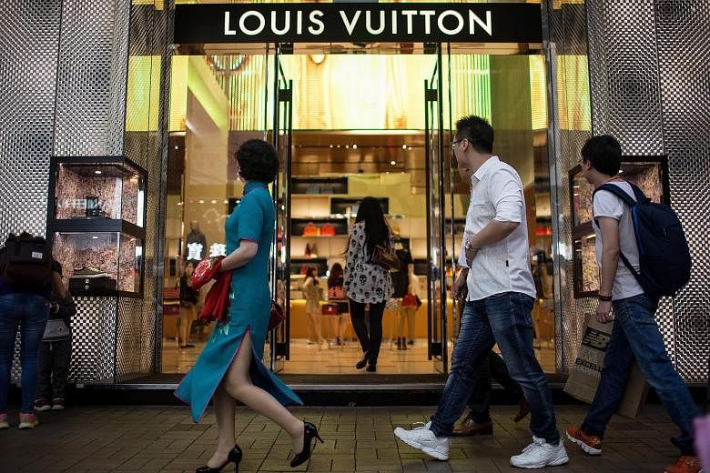 A Louis Vuitton store in Hong Kong. French giant LVMH, home of Louis Vuitton leather goods, said on Tuesday that its luxury retailer DFS performed especially well in Hong Kong and Macau, while its wines and spirits business grew rapidly in China.