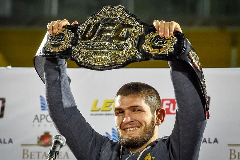 A joyous UFC lightweight champion Khabib Nurmagomedov upon his return to Makhachkala, Dagestan, on Monday. The vanquished Conor McGregor wants a rematch, but he has to serve a "medical suspension", while the Russian is set to be banned for a period b