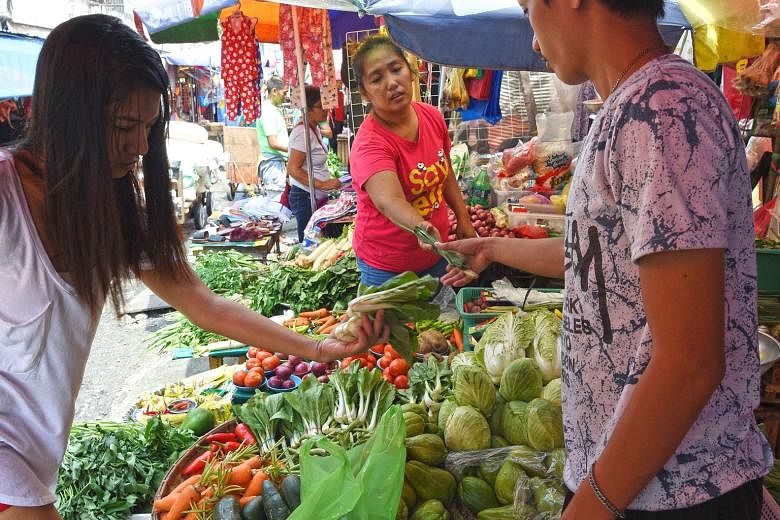 A market in Manila. Inflation has hit a nine-year high, after climbing for nine consecutive months.