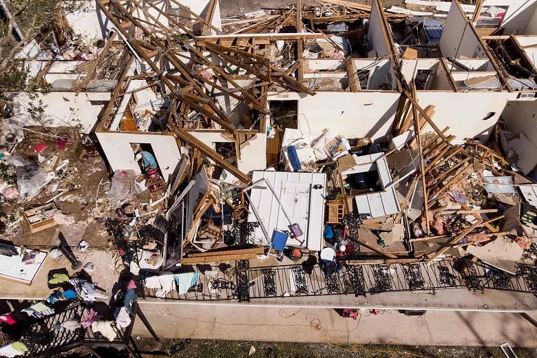 The remains of an apartment in the aftermath of Hurricane Michael in Panama City, Florida, on Thursday. Much of the coast of the Florida Panhandle, including Mexico Beach and Panama City, was left in ruins by the hurricane. The area is dotted with sm