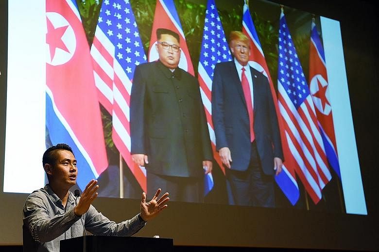 ST photojournalist Kevin Lim yesterday gave a behind-the-scenes account of how he covered the historic Trump-Kim summit in June, at the second of a series of four weekends of talks by The Straits Times and World Press Photo award-winning photojournal