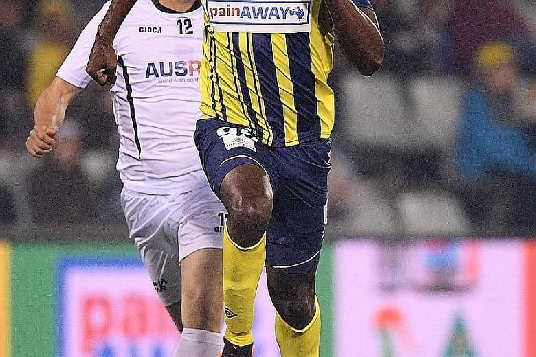 Bolt scores two goals for A-League football club Central Coast Mariners in his first start for the club against Macarthur South West United in Sydney on Friday.